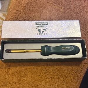 Snap on 75 year anniversary green and gold screwdriver